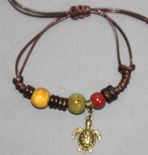 Bracelet ajustable avec perles et breloques N°144